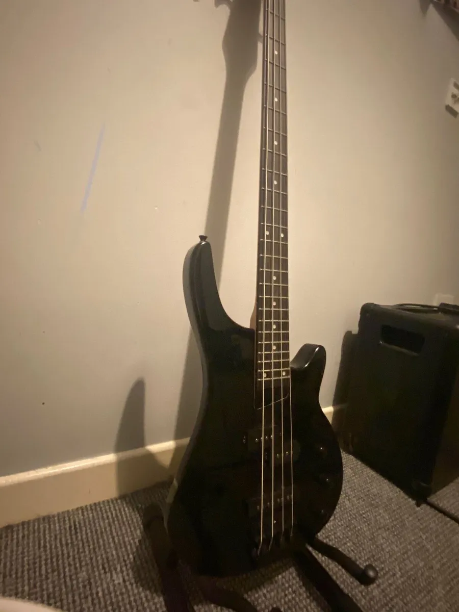 Bass guitar with stand - Image 3