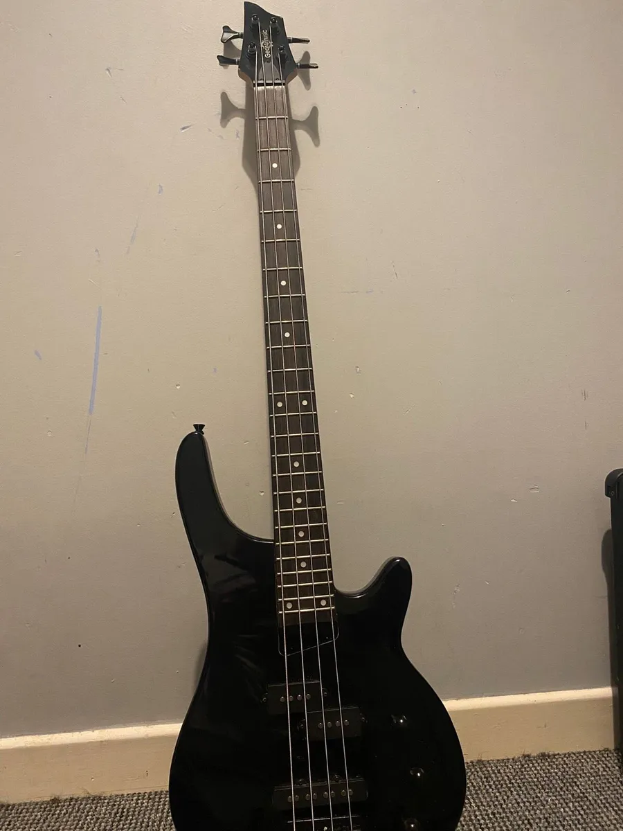 Bass guitar with stand - Image 1