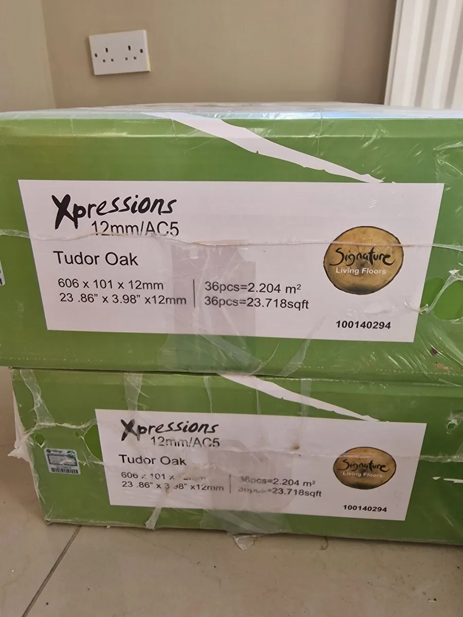 Xpressions AC5 tudor oak herringbone laminate - Image 1