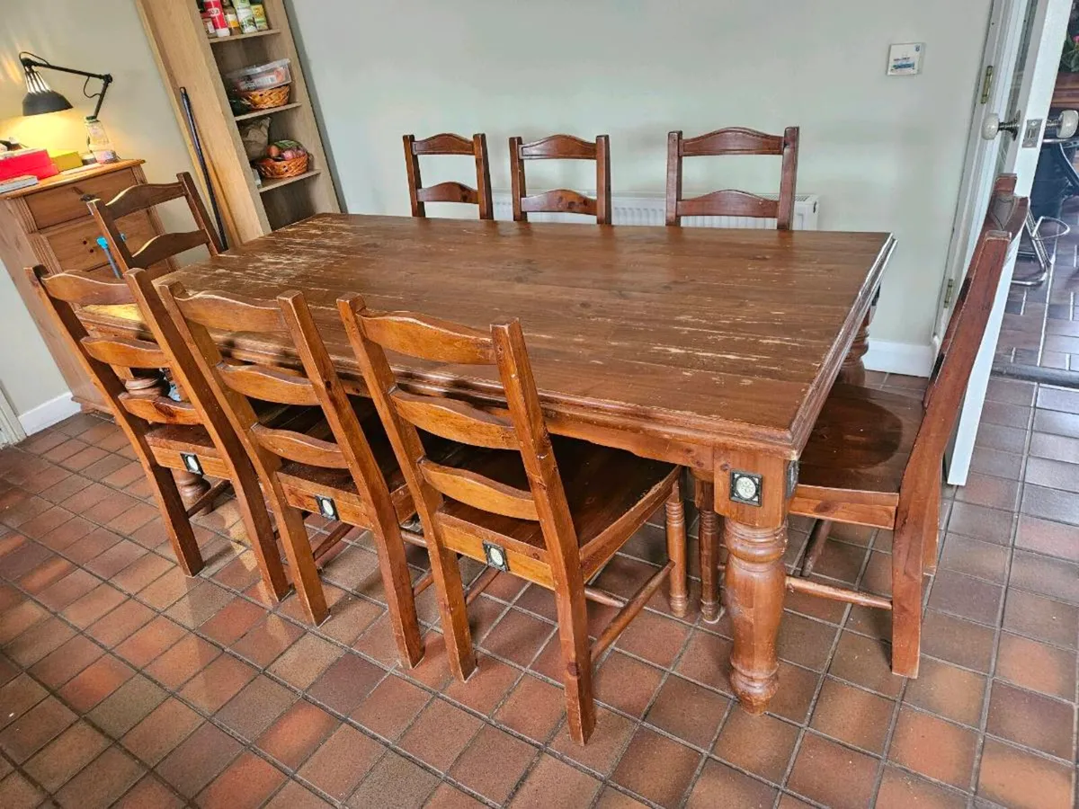 Solid wooden kitchen table and 8 matching chairs - Image 1