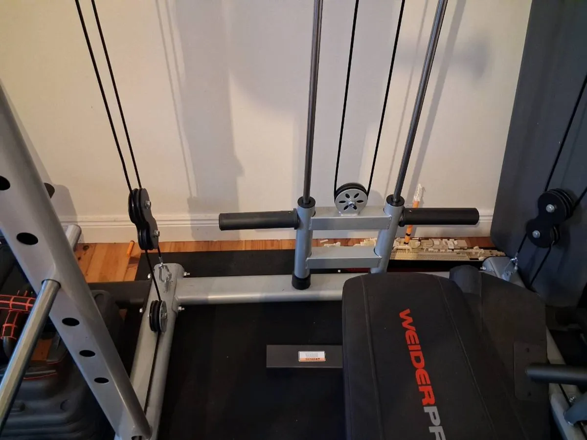 Multi-gym rack, weights, olympic bar and bench - Image 4
