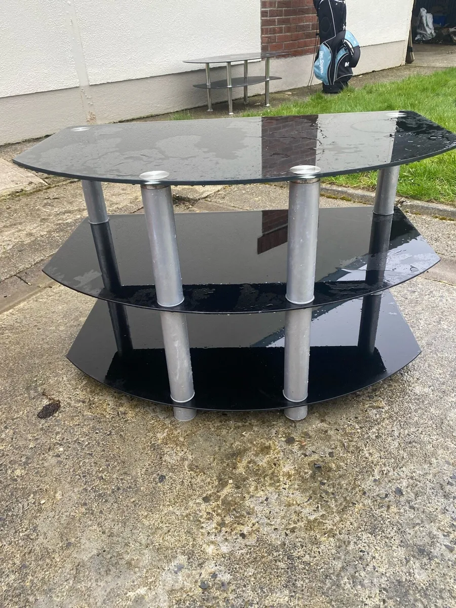 Black TV stand and coffee table. - Image 1