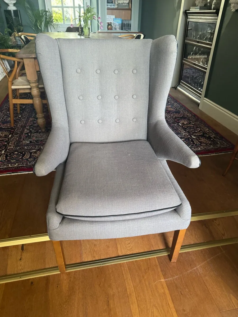 Grey fabric Arm chair with black piping - Image 1