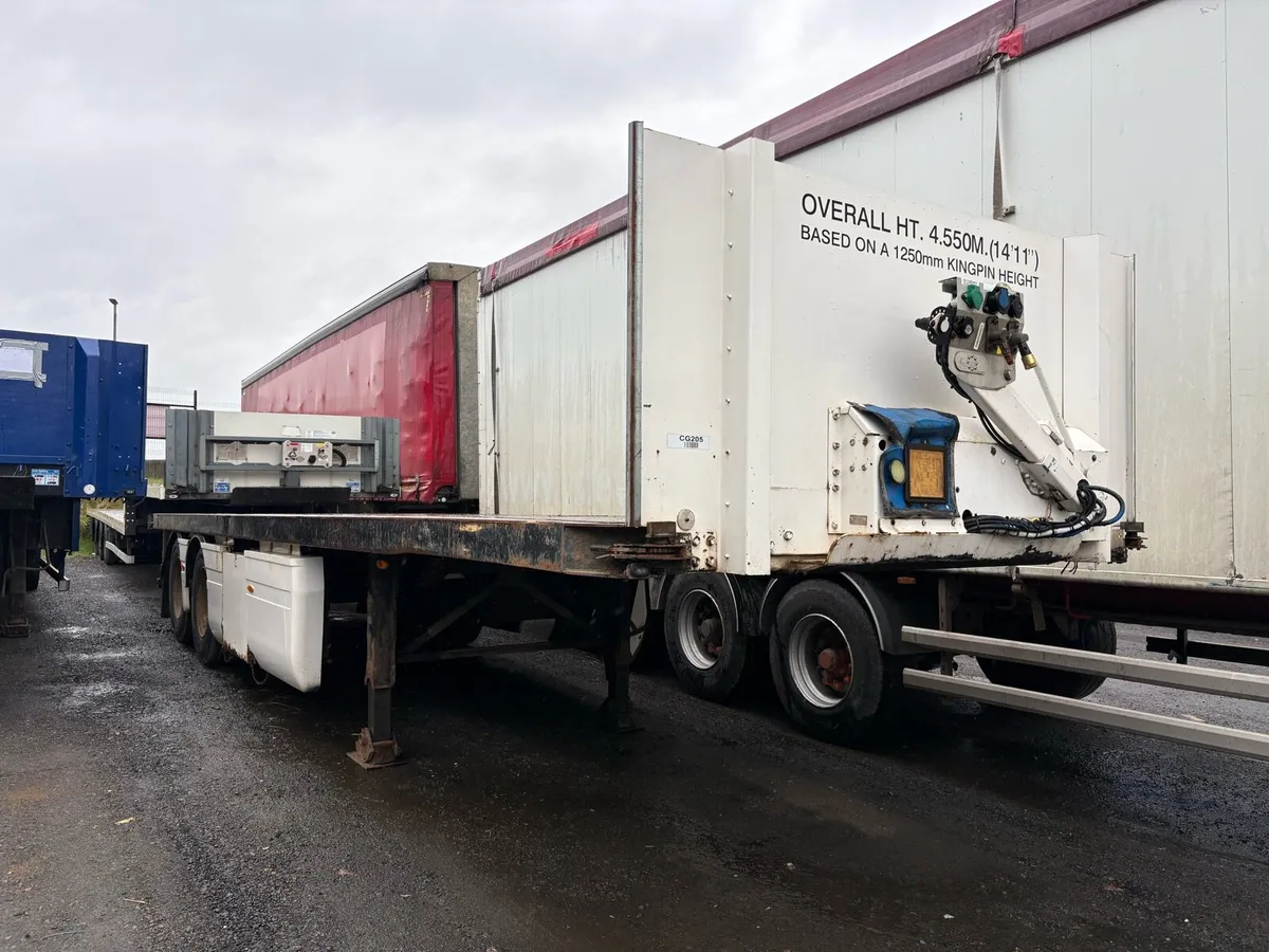 2010 Donbur 32Ft Flat Trailer Moffett Brackets - Image 1