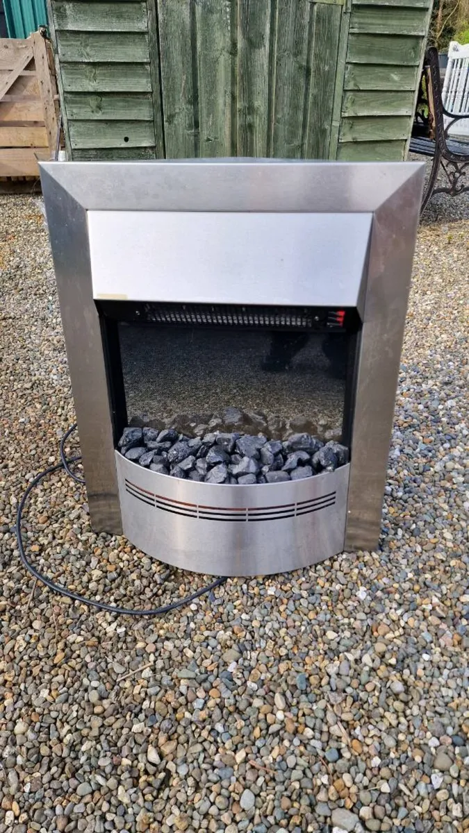 Dimplex electric fireplace heater - Image 1