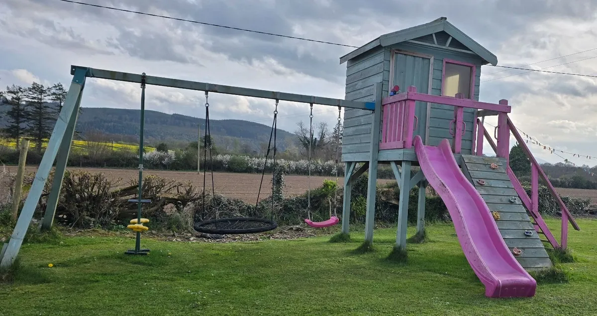 Wooden Playhouse and Activity Centre - Image 1