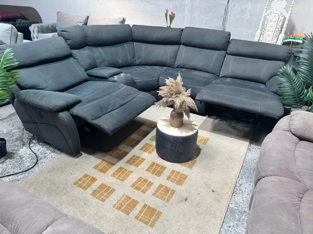 Electric recliner corner sofa with cup holders - Image 1