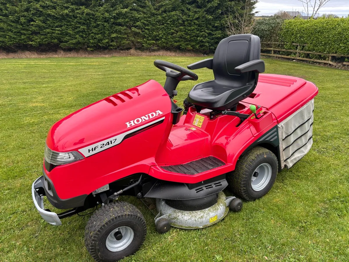 Honda 247 ride on lawnmower - Image 1