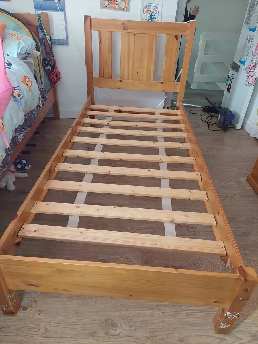 2 solid wood single beds no mattress