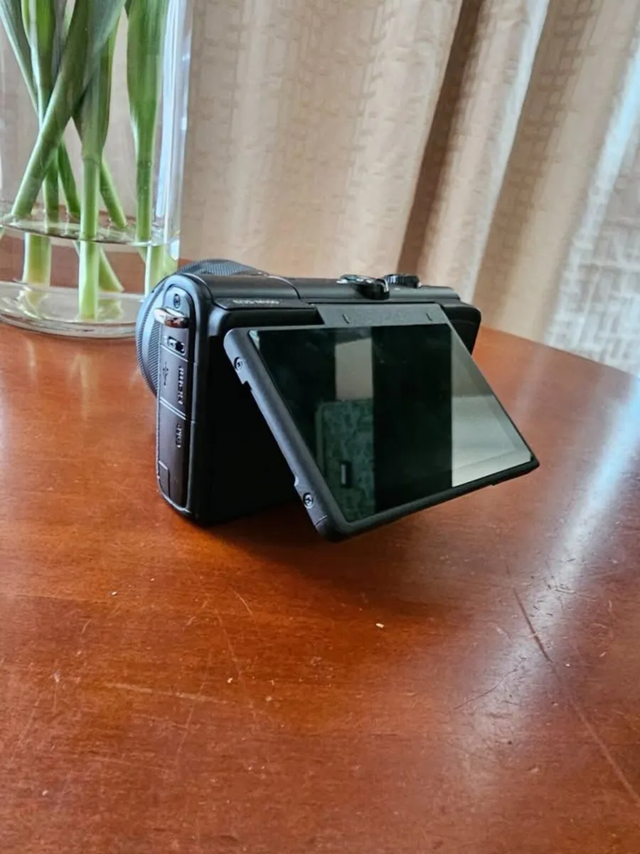 Canon EOS M100 with Image Stabilizing Lens - Image 1