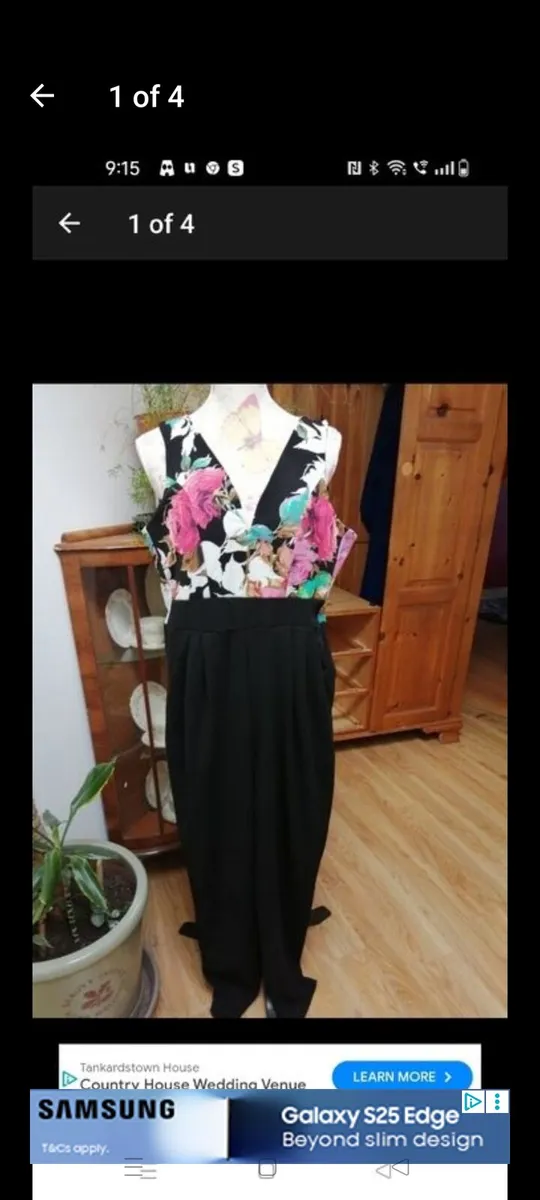 Ladies Jumpsuit black with flowel detail on the to - Image 1