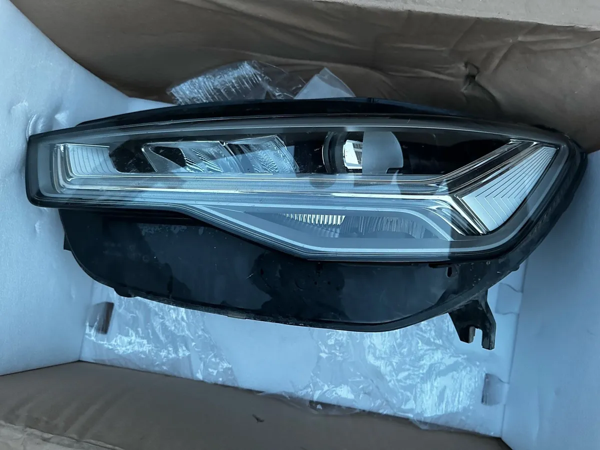 2016 Audi A6 left front headlight - Image 1