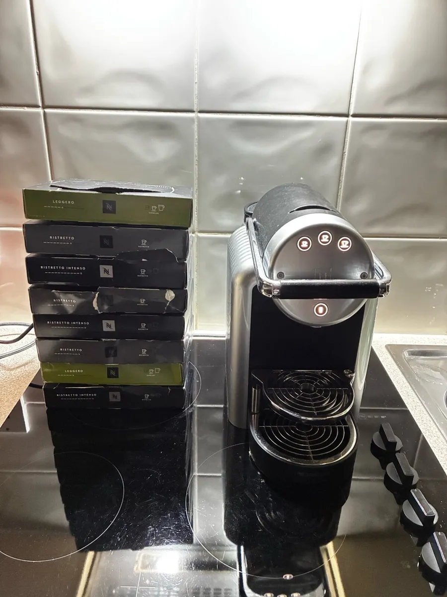 Nespresso coffee machine and pods - Image 1