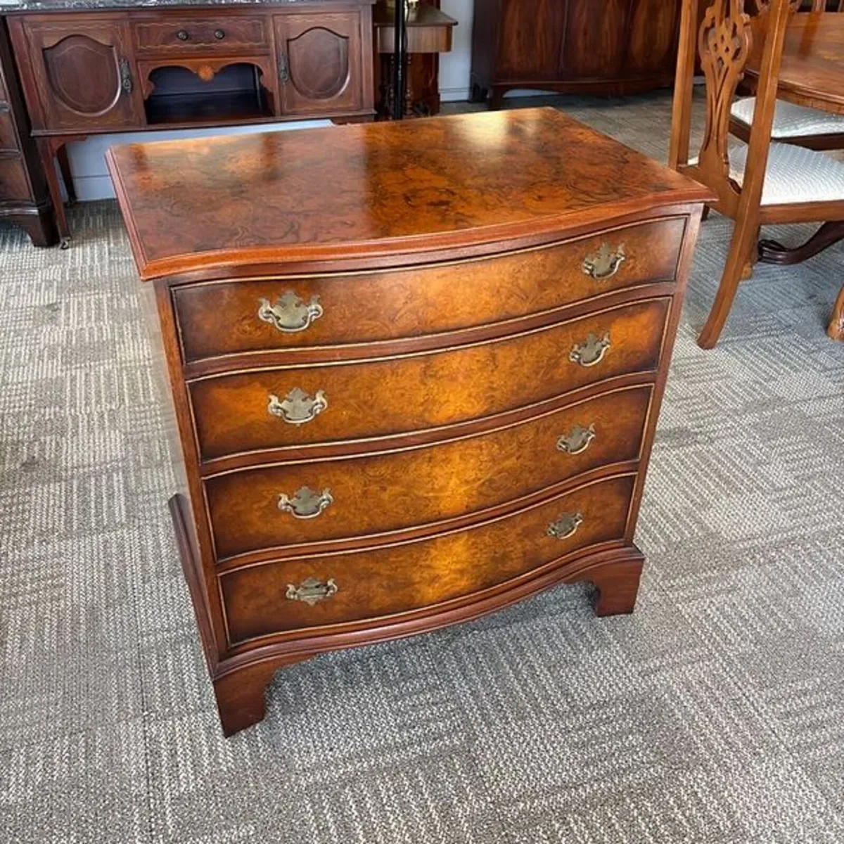 Bevan Funnell walnut serpentine chest of drawers