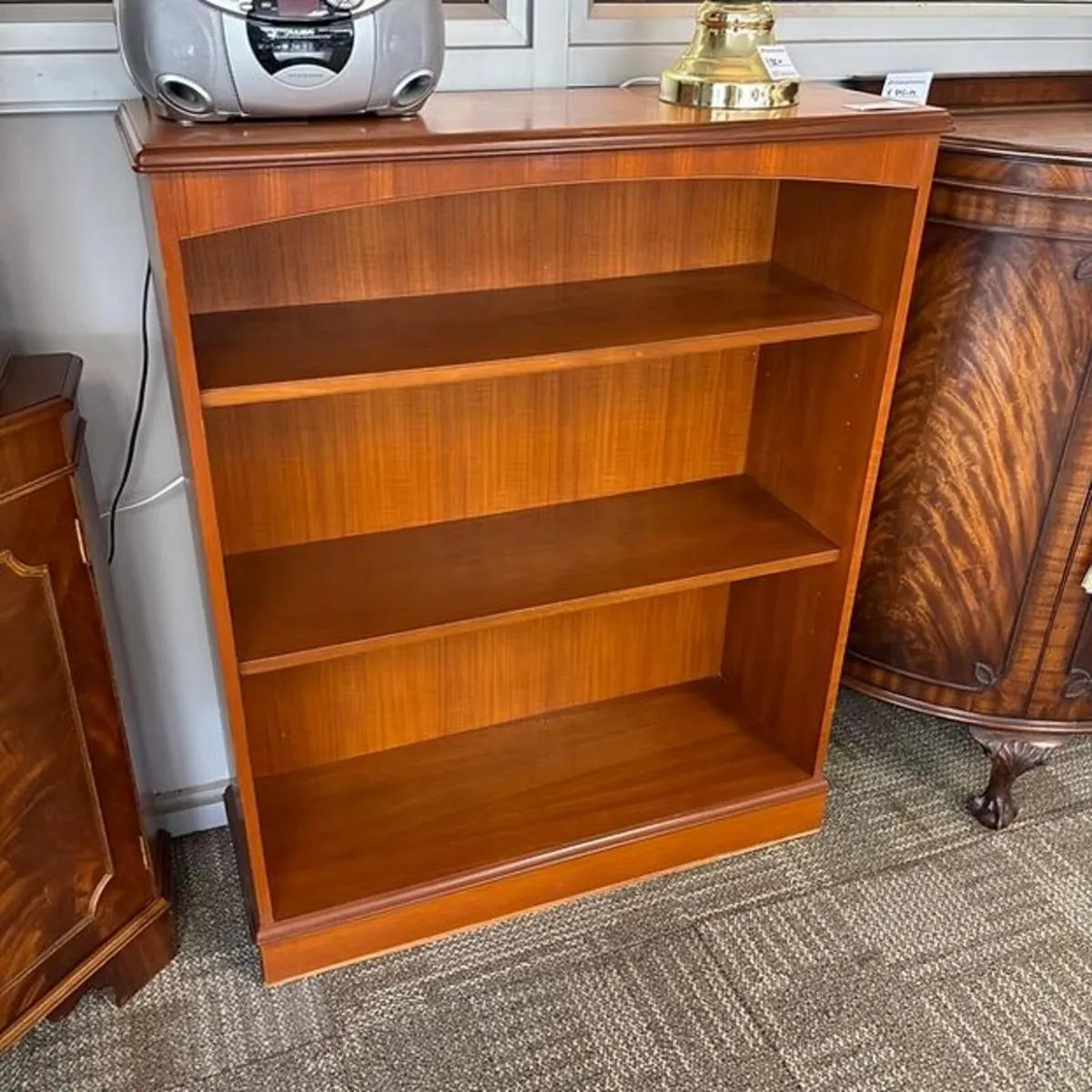 Mahogany open bookcase with two shelves