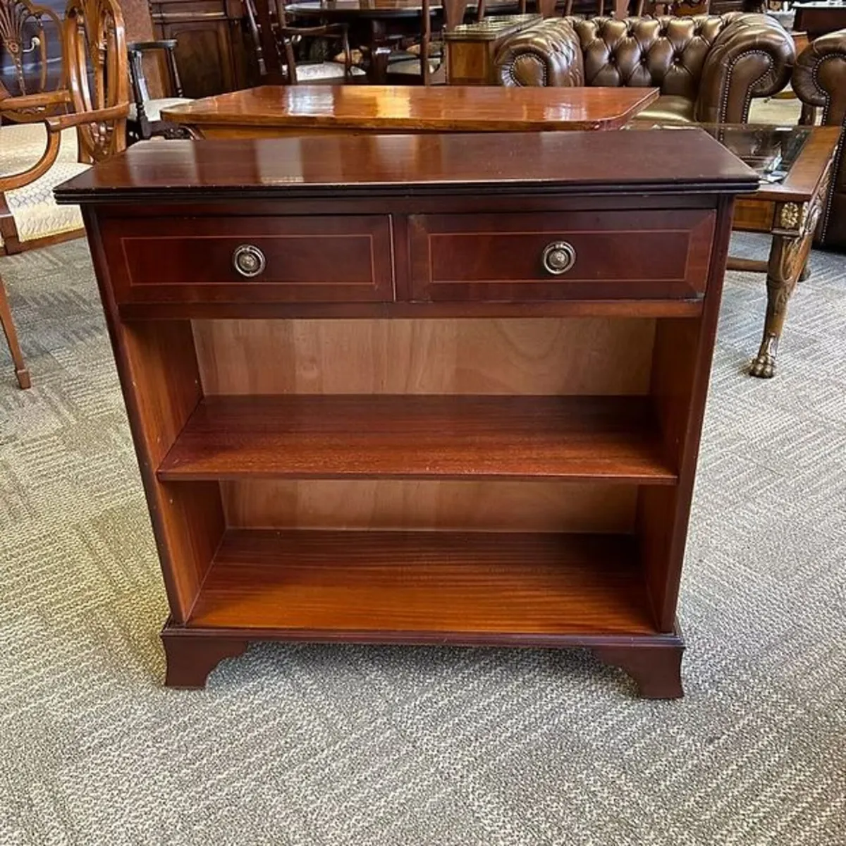Open mahogany wooden bookcase with two drawers