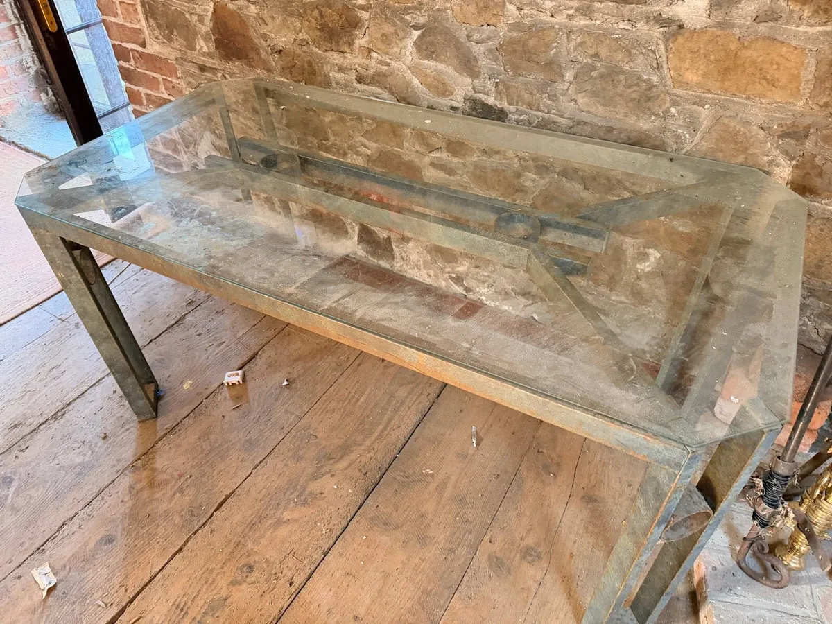 Metal table with glass top