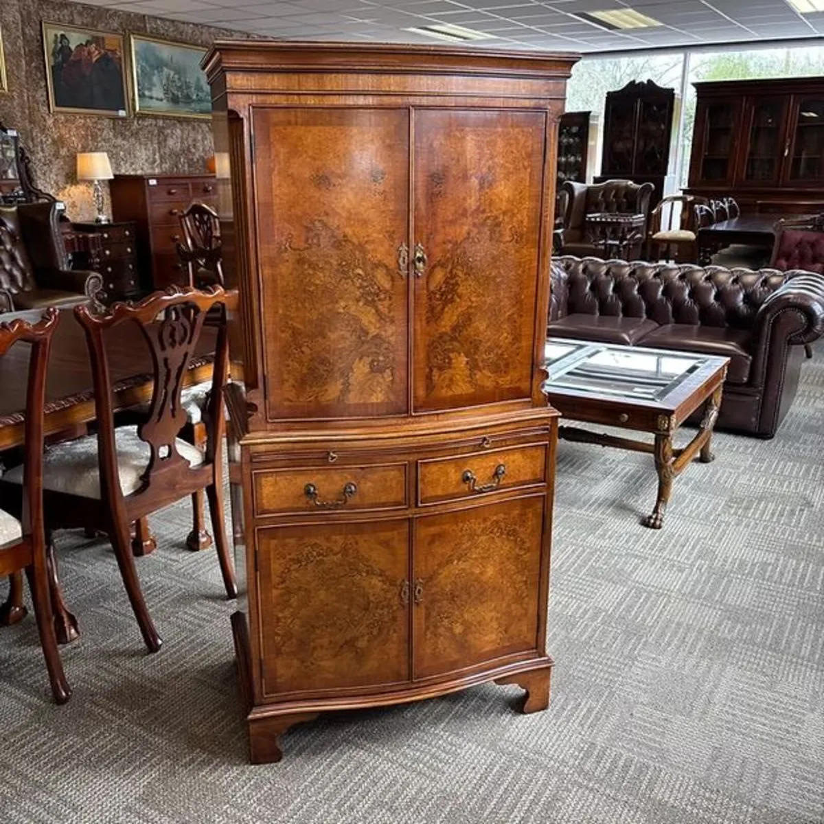 Late 20th century walnut drinks cabinet with shape
