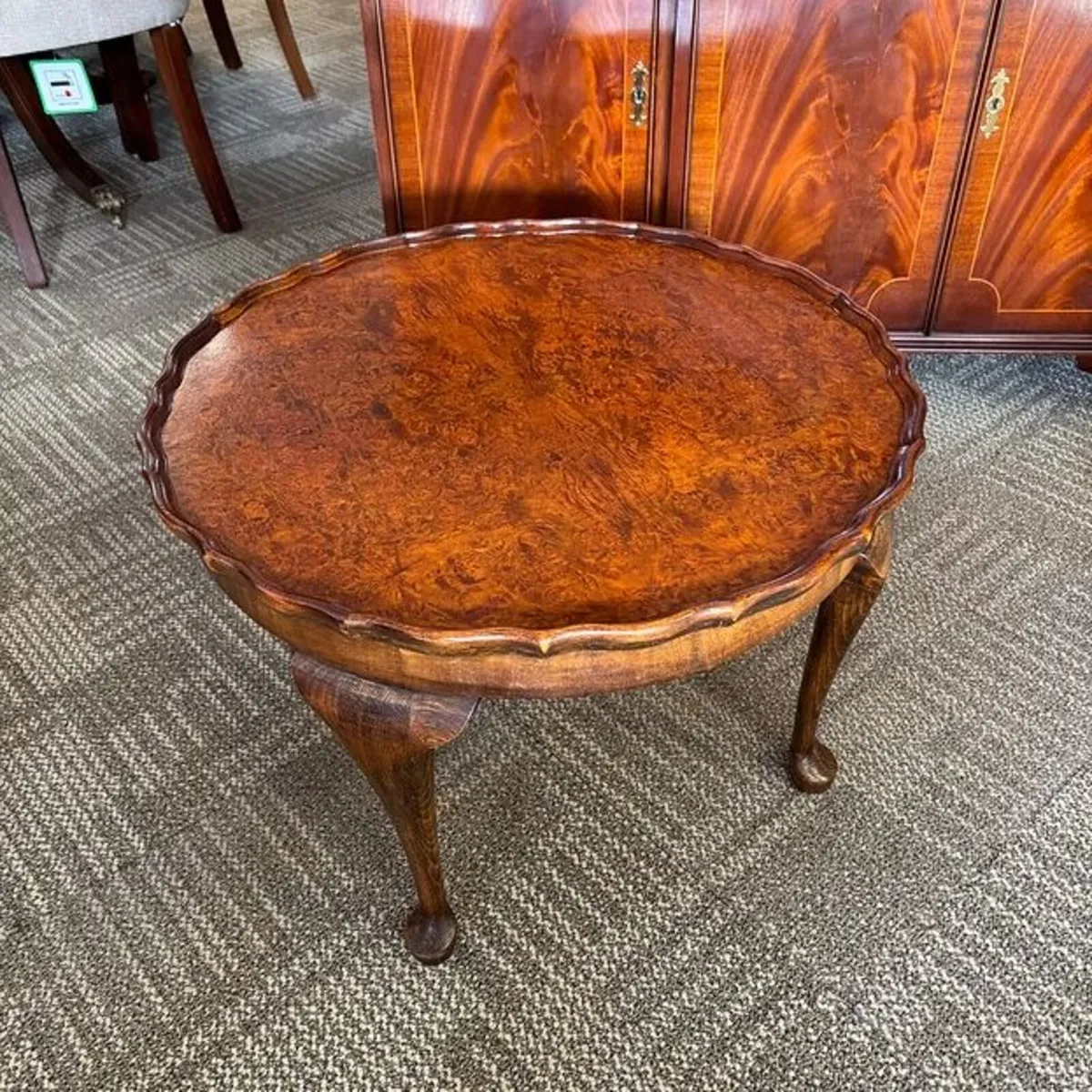 H. Shaw London walnut coffee table with shaped edg