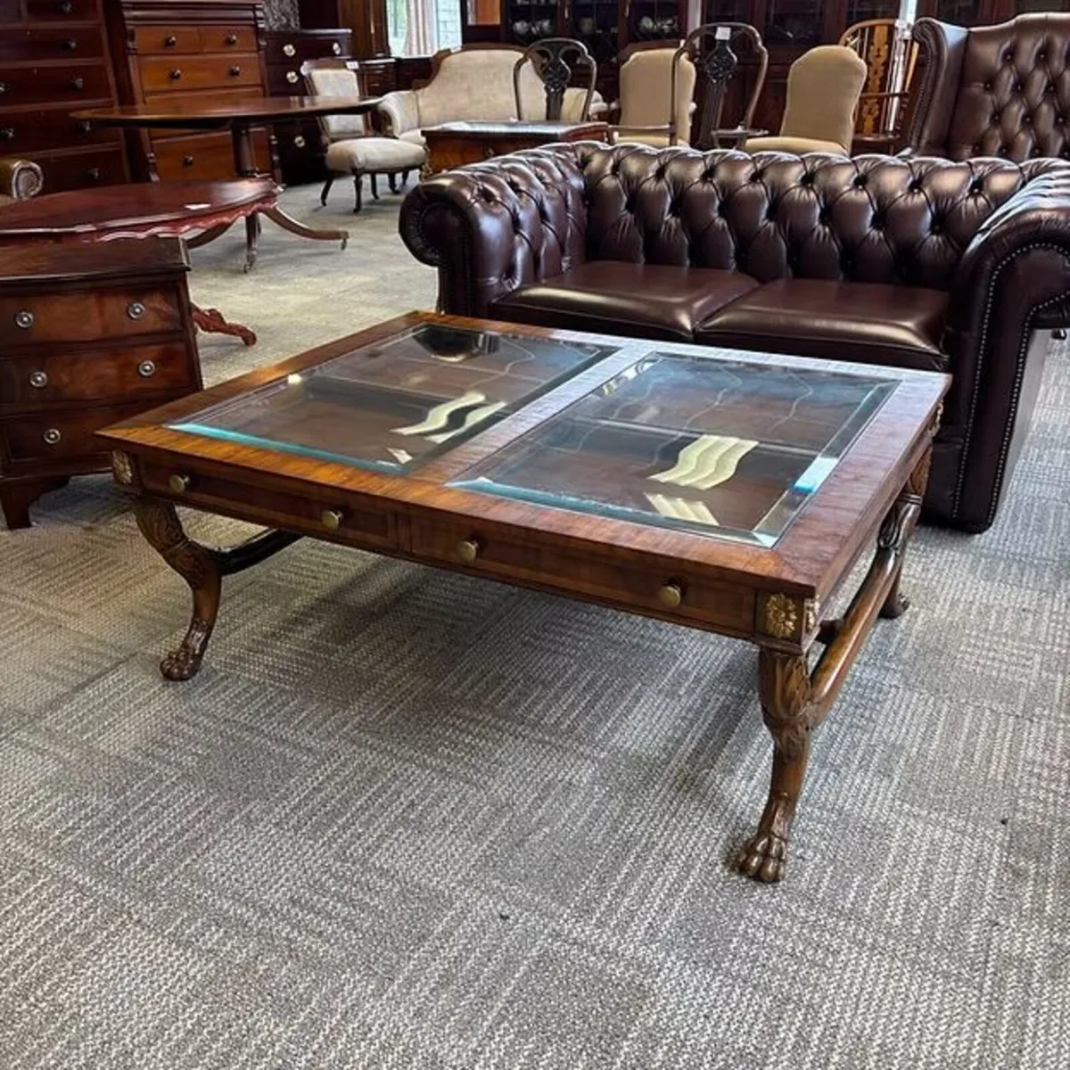 Fabulous glass top mahogany tier coffee table