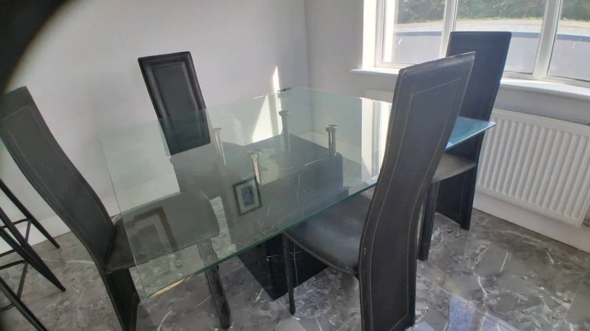 Modern glass table with marble base and 4 chairs - Image 3