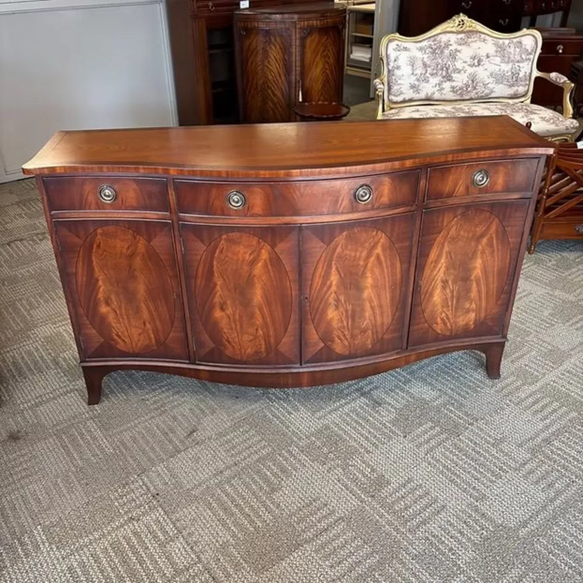 Fabulous mahogany flamed bow front four drawer / d