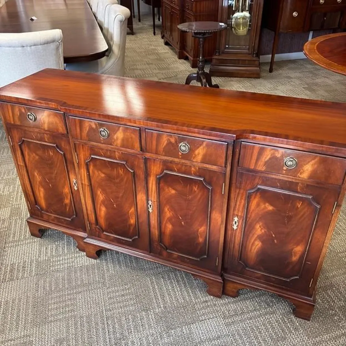 Fabulous mahogany flamed breakfront four drawer