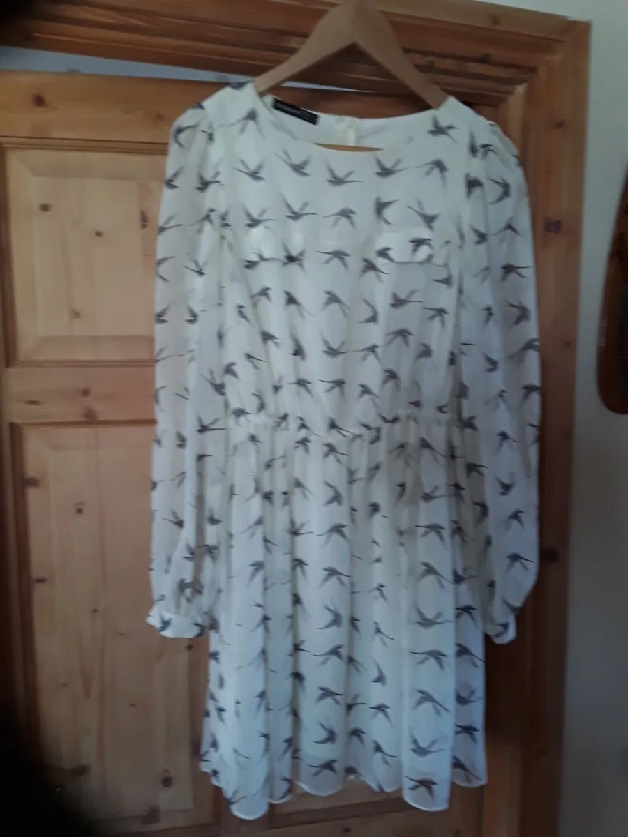 Lovely top in new condition size 14