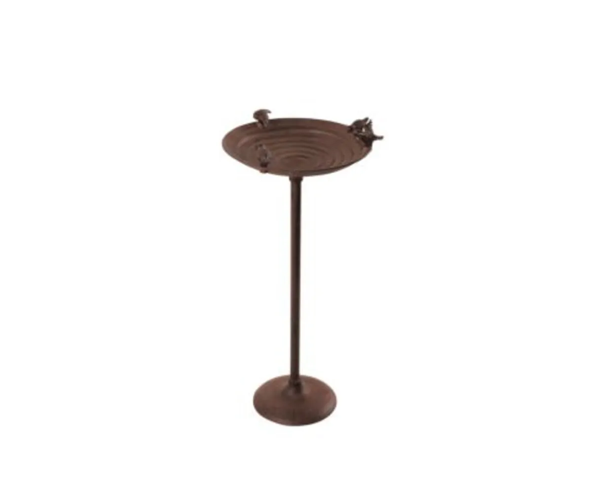Cast iron birdbath on pole