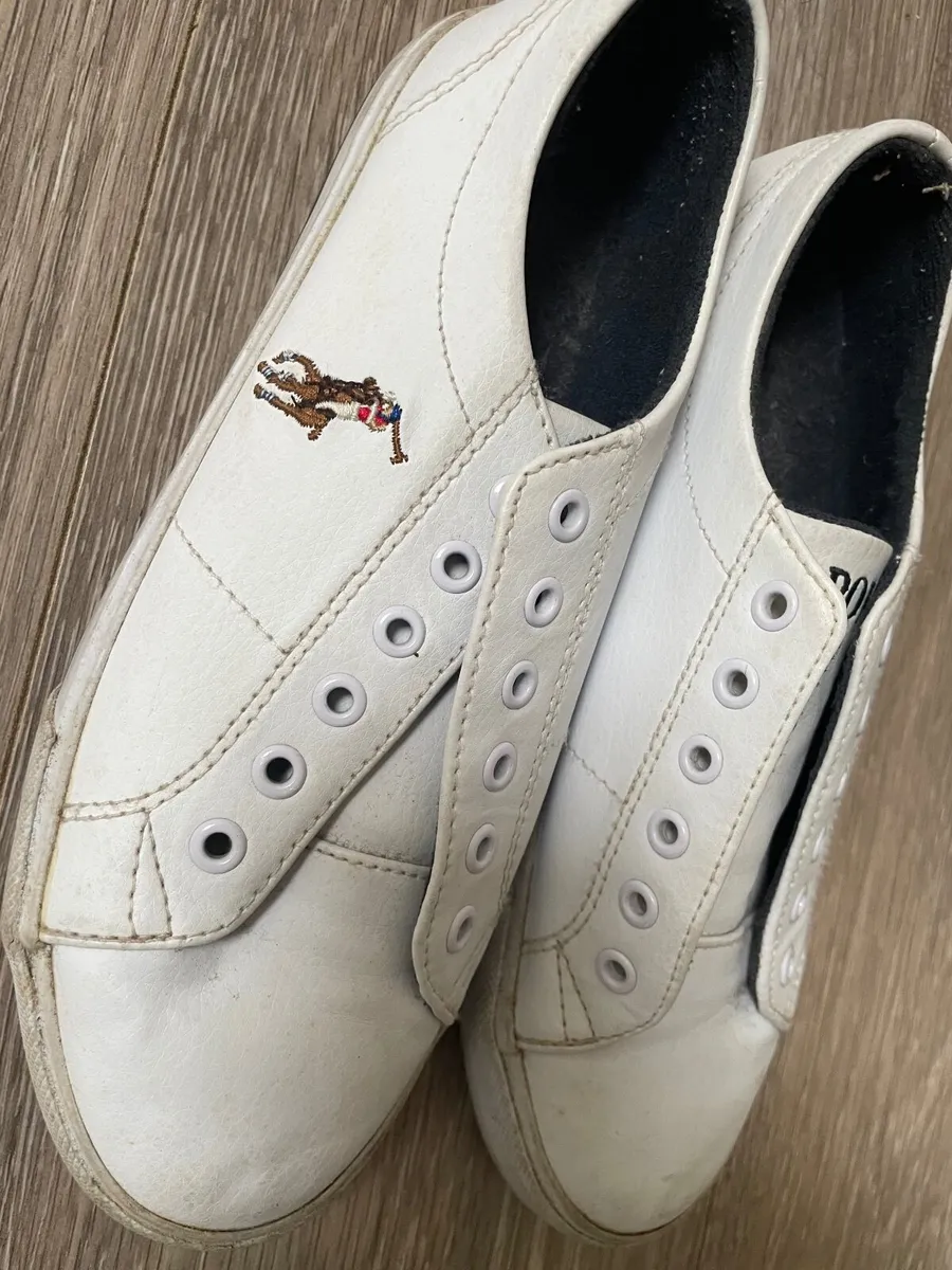 White Polo Ralph Lauren trainers feature a signatu - Image 1