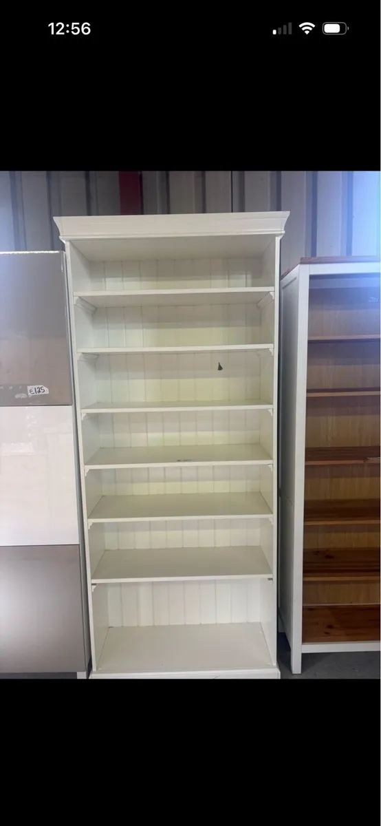 2 white bookcases