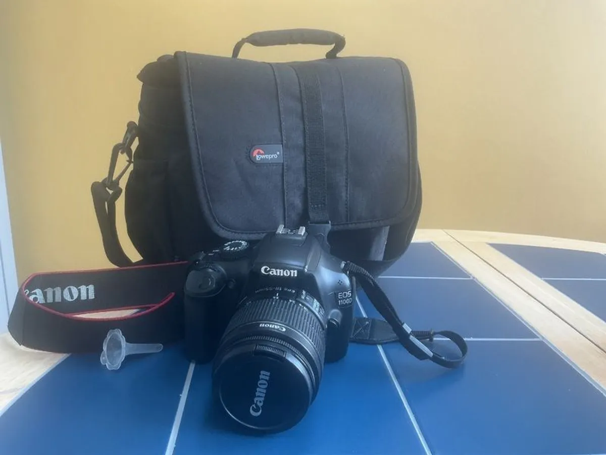 Canon EOS complete with camera bag.