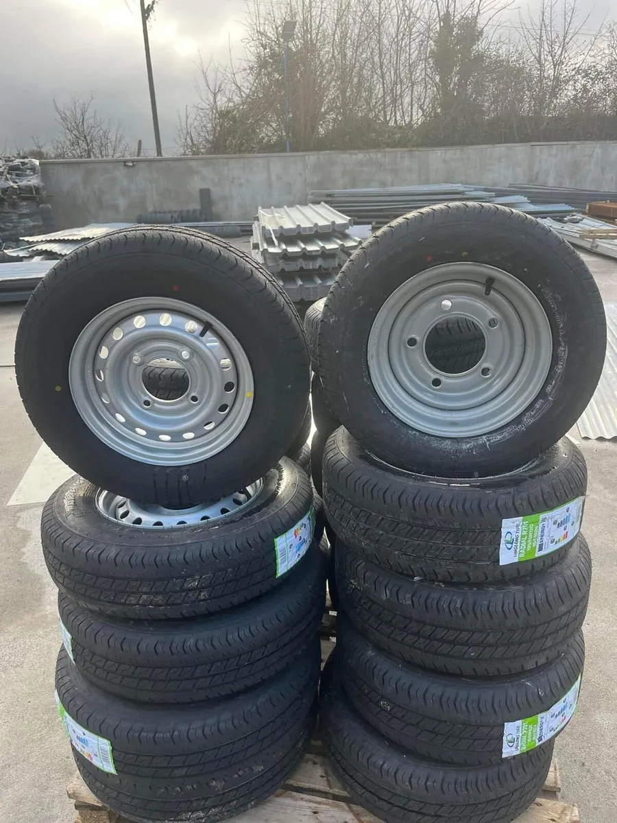 trailer wheels and parts - Image 1