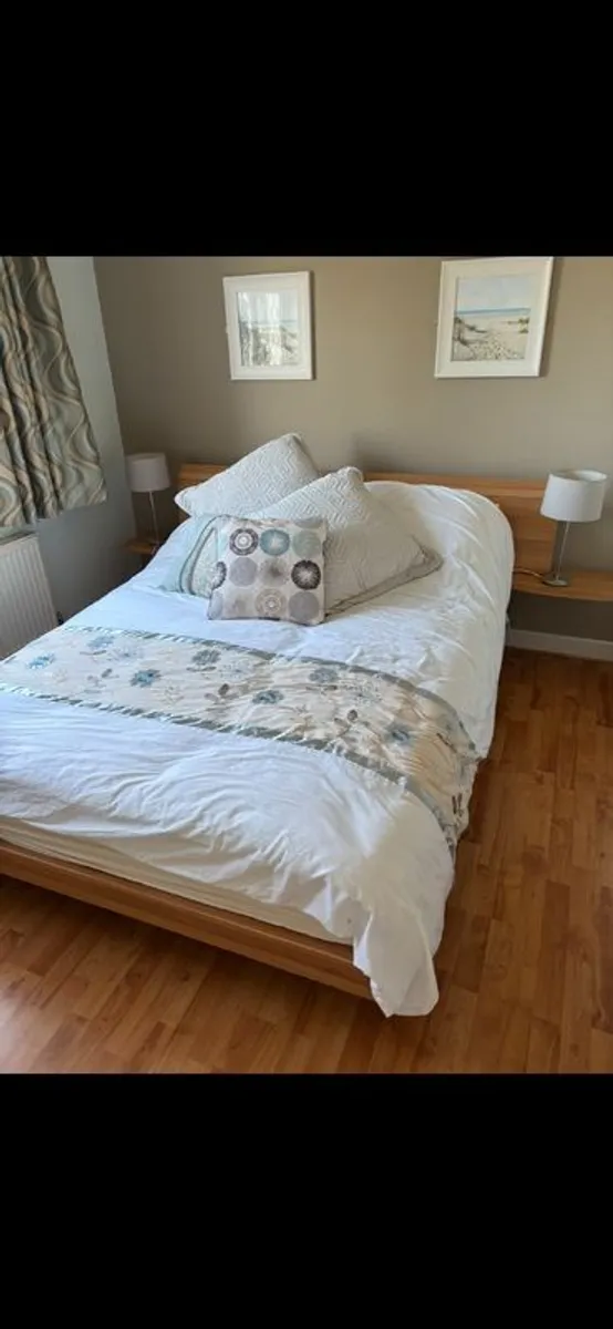 5 foot bed frame with headboard and side selves - Image 1