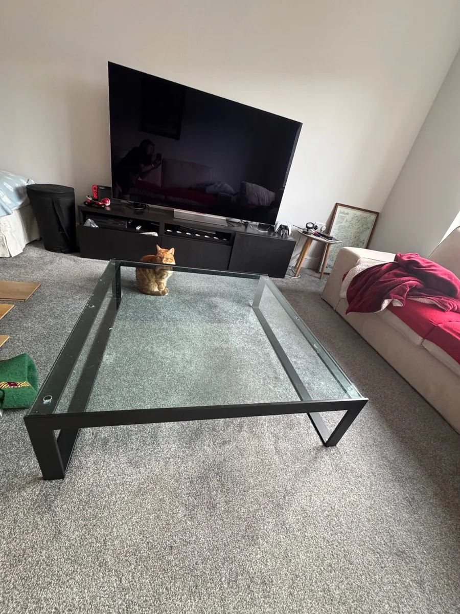 Stylish Glass and Black Steel Coffee Table - Image 2