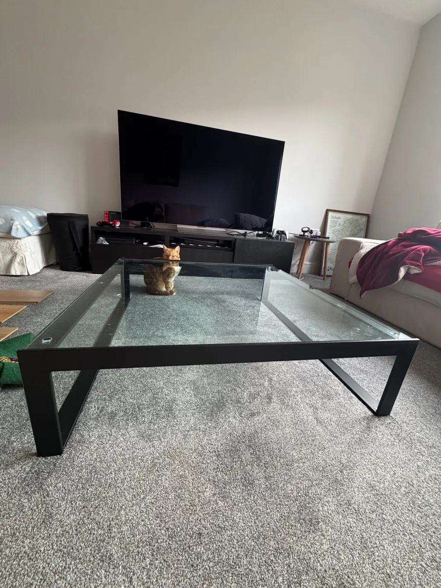 Stylish Glass and Black Steel Coffee Table - Image 3