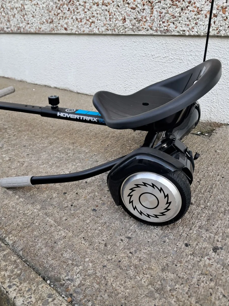 Hoverboard with seat attachment - Image 1