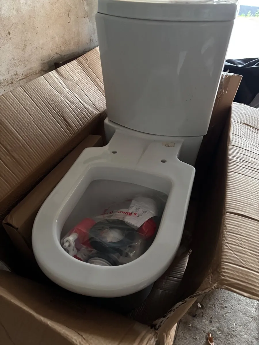 New Toilet inc seat cover - Image 1