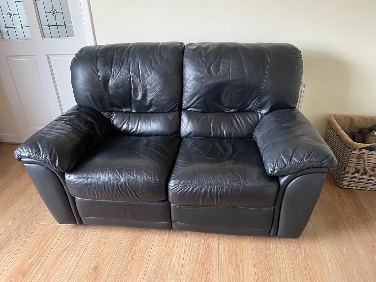 2 seater leather couch with a recliner mechanism - Image 2