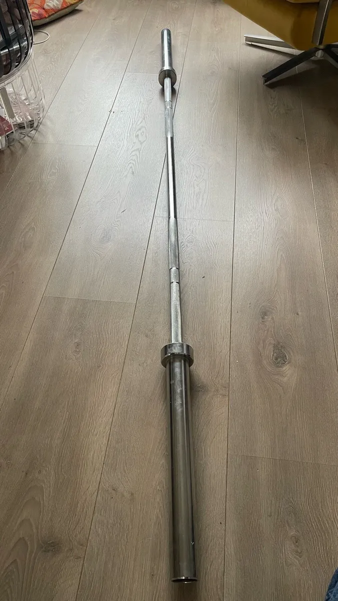 Olympic bar + 2x10 + 2x5 kg weights - Image 2