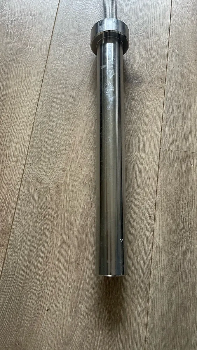 Olympic bar + 2x10 + 2x5 kg weights - Image 3