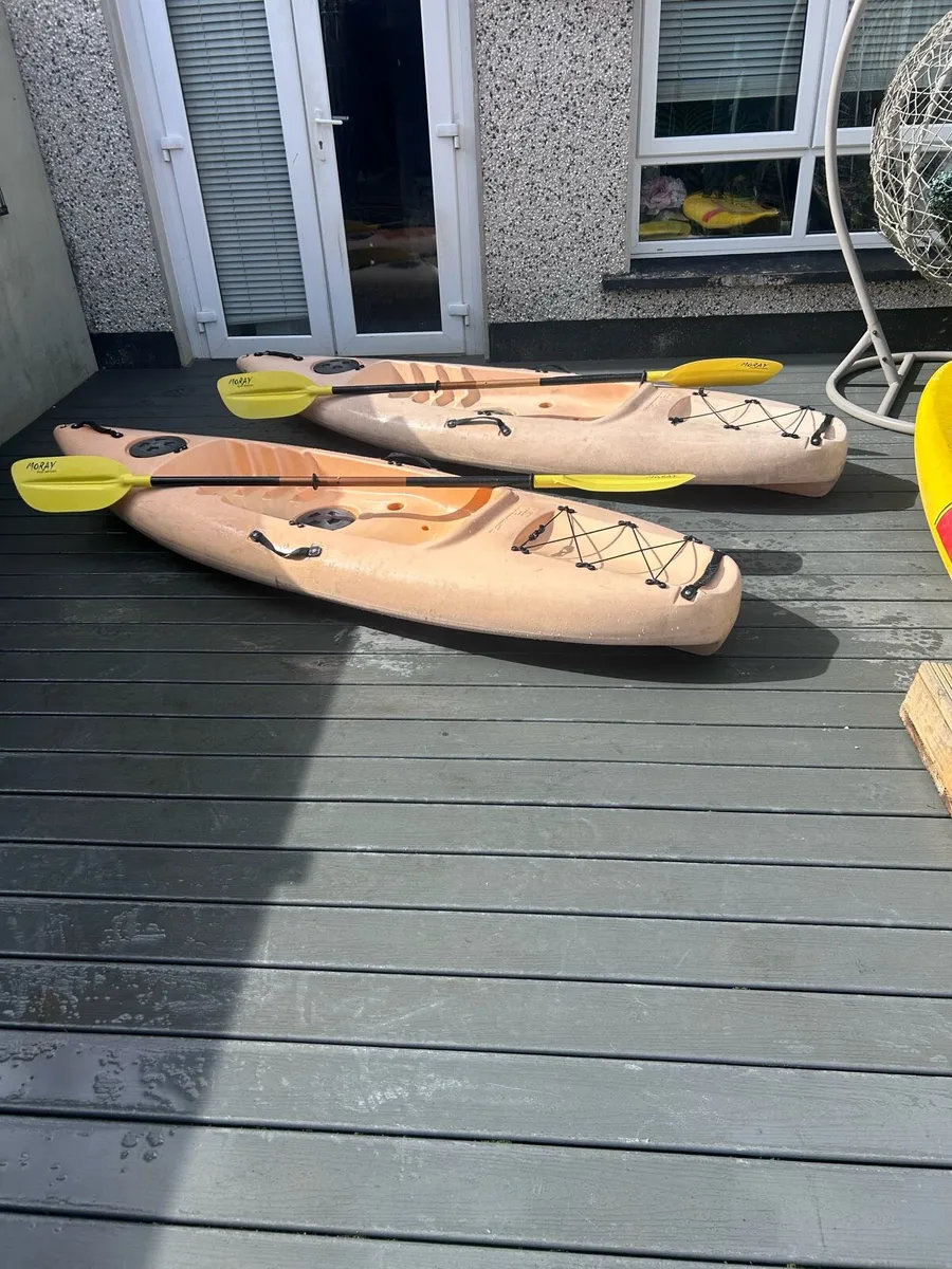 2 sit on top kayaks and paddles - Image 1