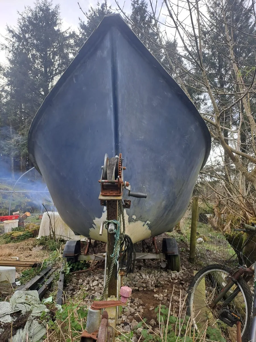 Fibreglass boat Hull and trailer - Image 1