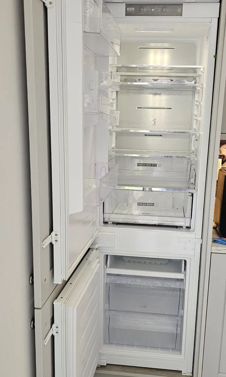 Whirlpool integrated fridge and freezer - Image 1