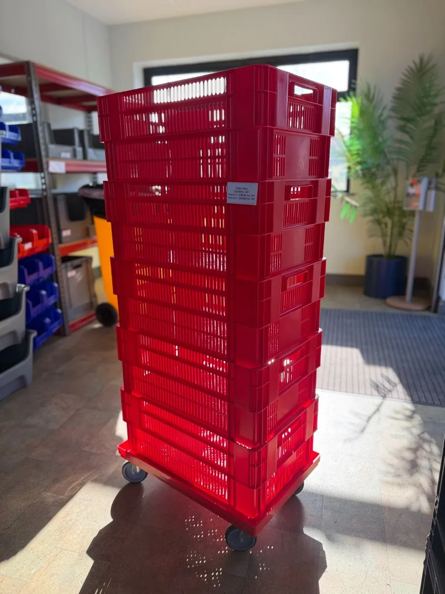 Plastic dollys on wheels - Image 1