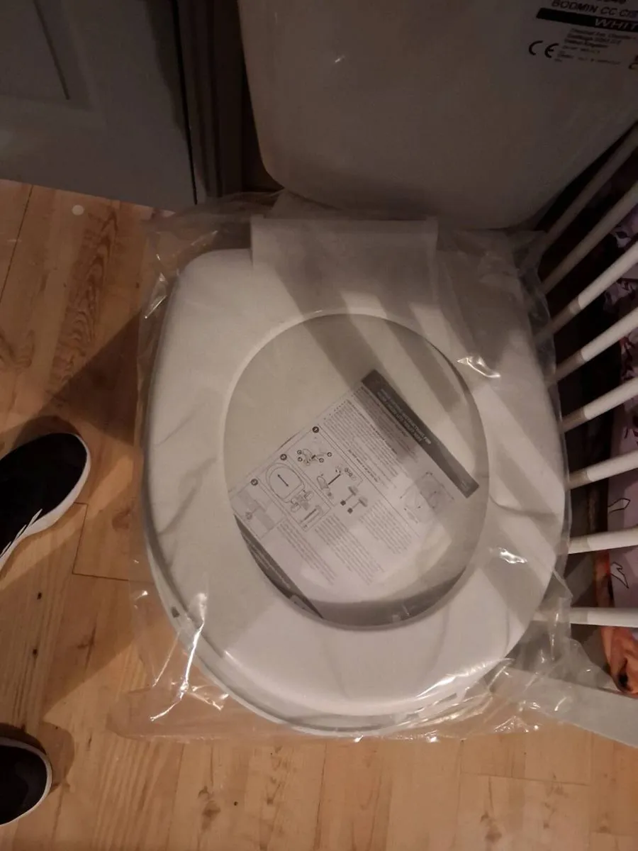 New Toilet, cistern and seat. - Image 1