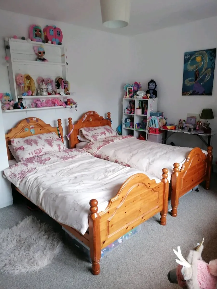 2 single solid pine beds