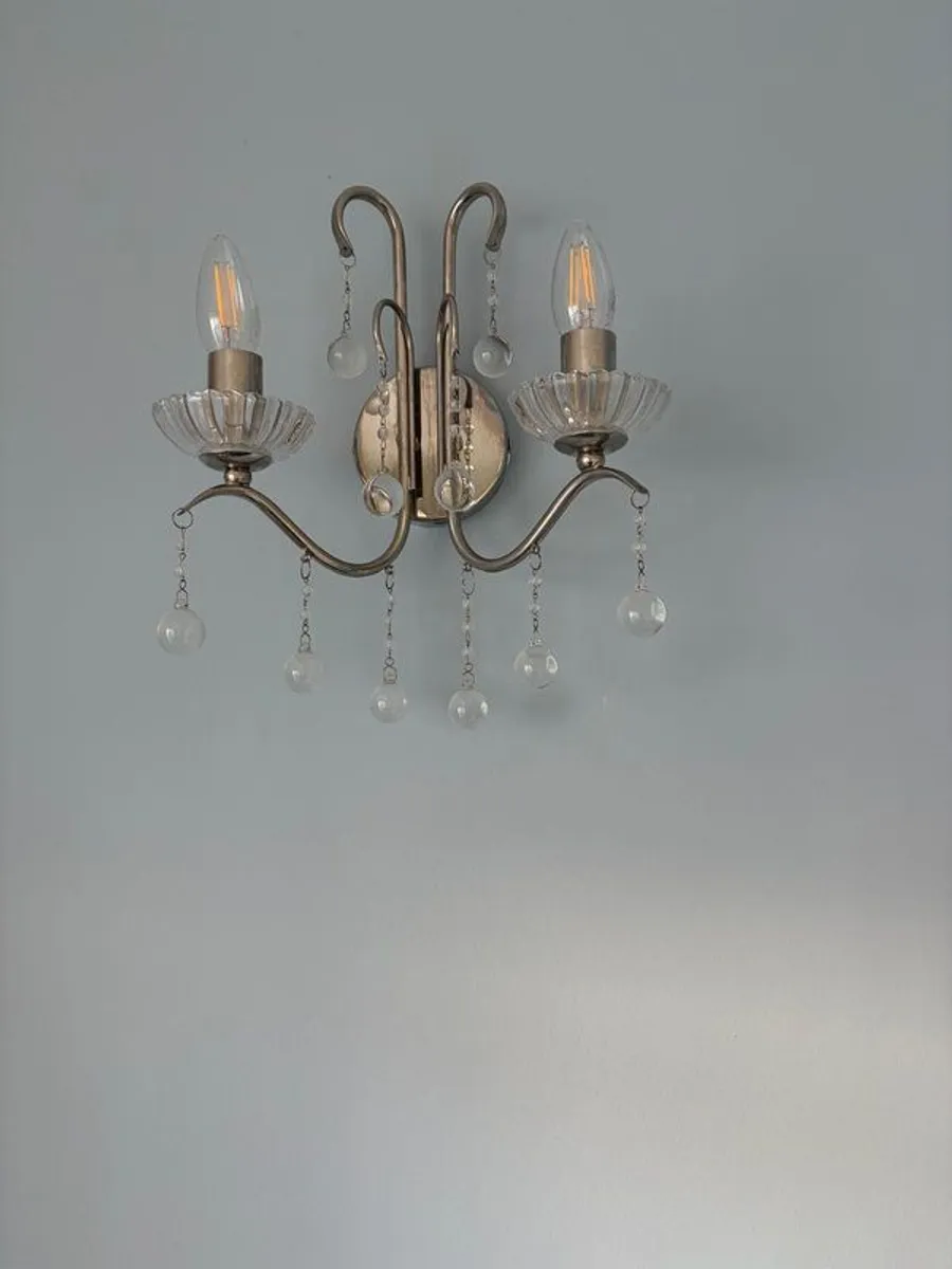 2 x wall lights and 2 x ceiling lights, silver in colour100 each for ceiling lights and 50 each for wall lights - Image 1