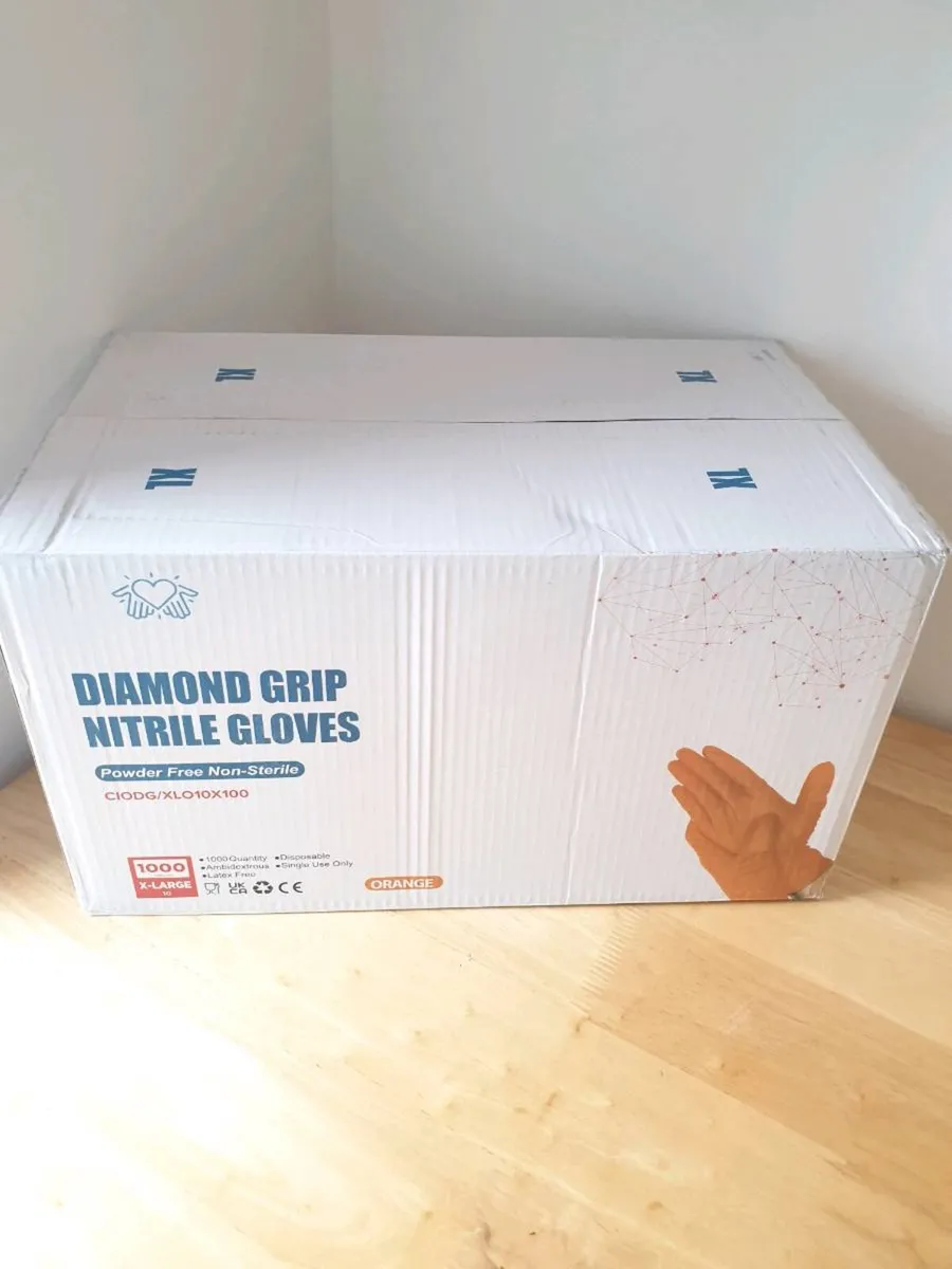 8.5 Mil Orange Diamond Grip Nitrile Gloves - Image 1