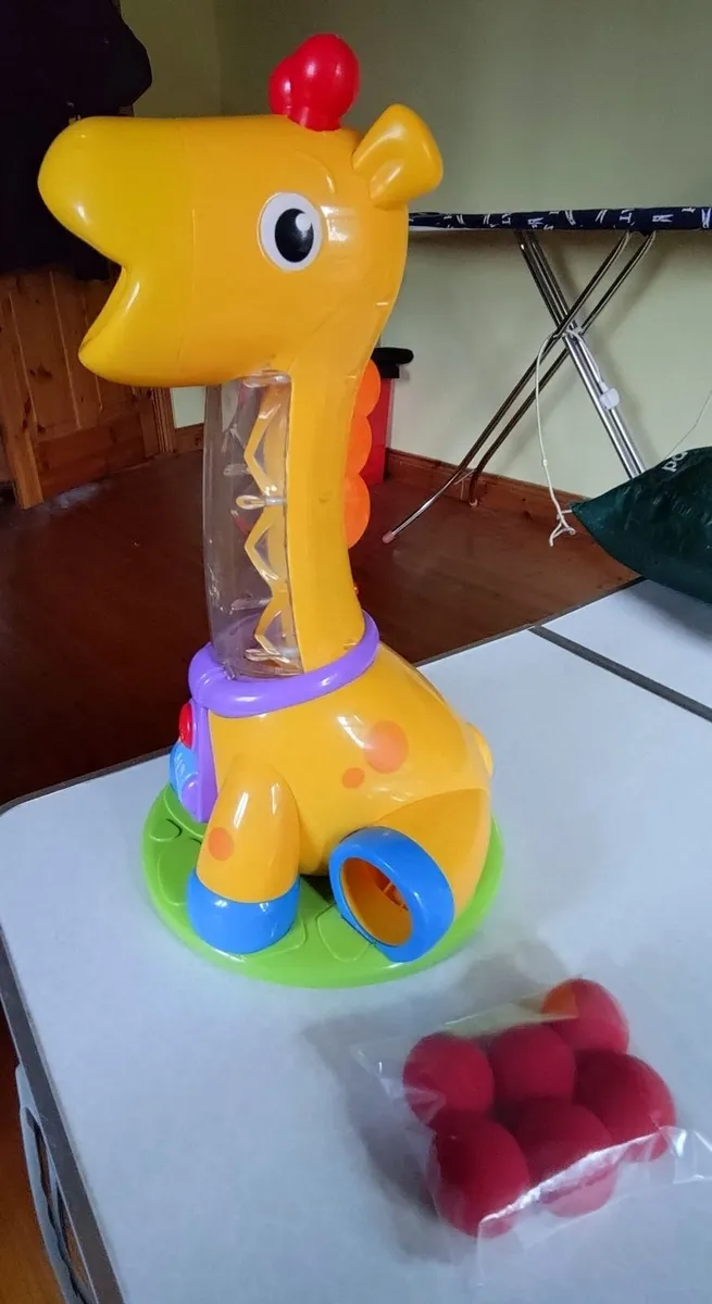 Spin & Giggle Tall Plastic Giraffe Toy, For Kids. - Image 2